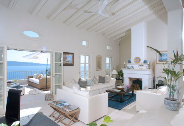 Living room with fireplace and seaview