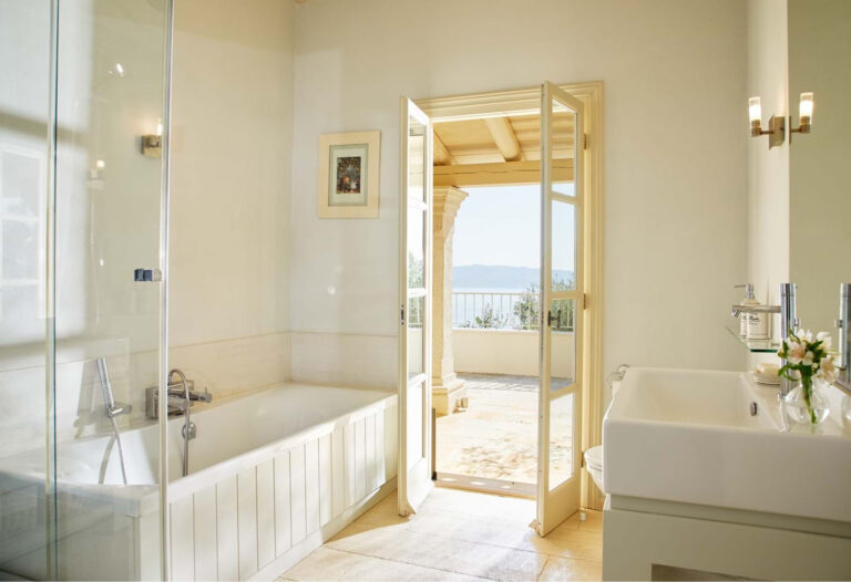 Bathroom interior with bathtub and sea view