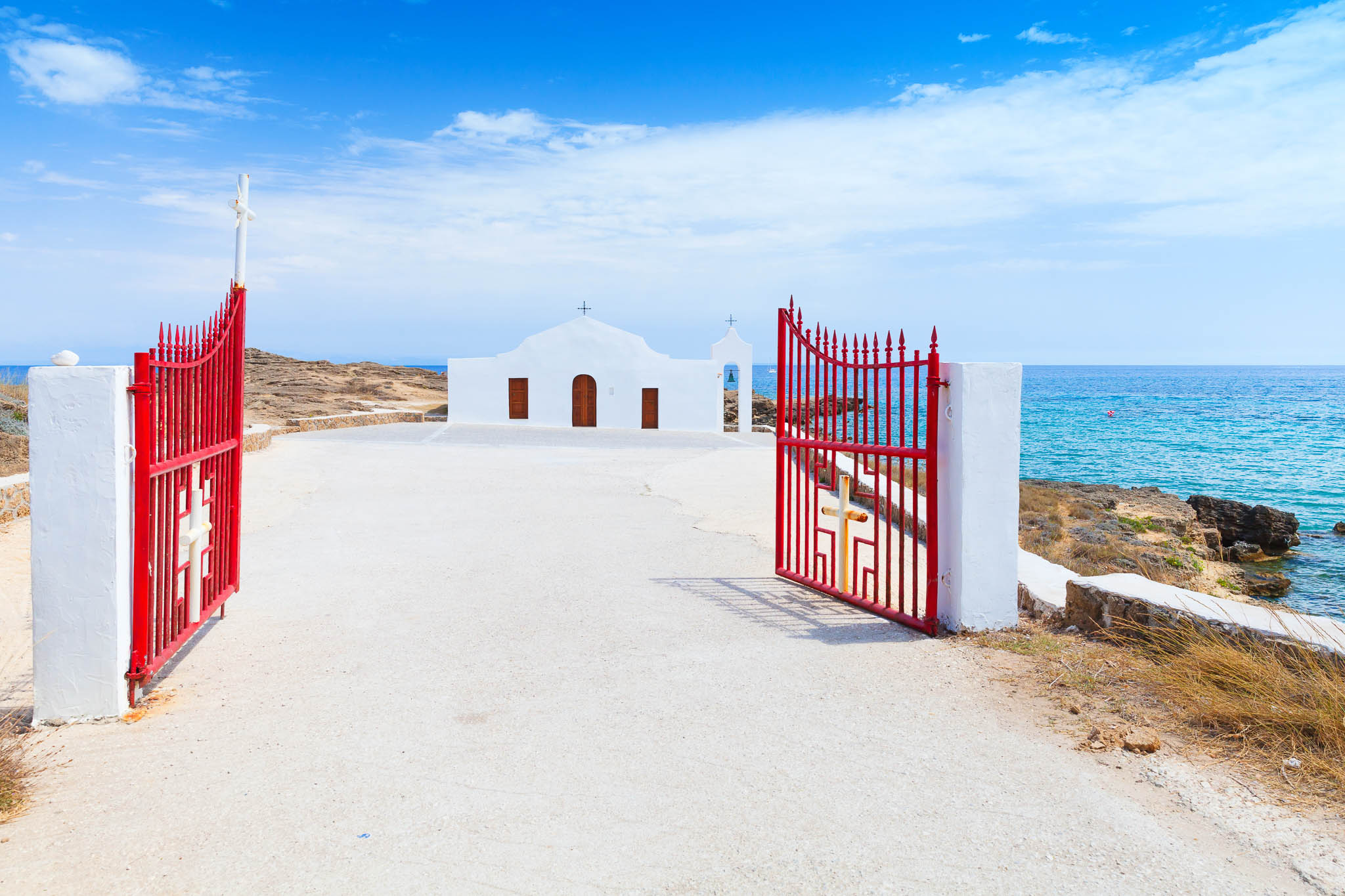 Agios,Nikolaos.,Open,Red,Gate,And,White,Orthodox,Church,On
